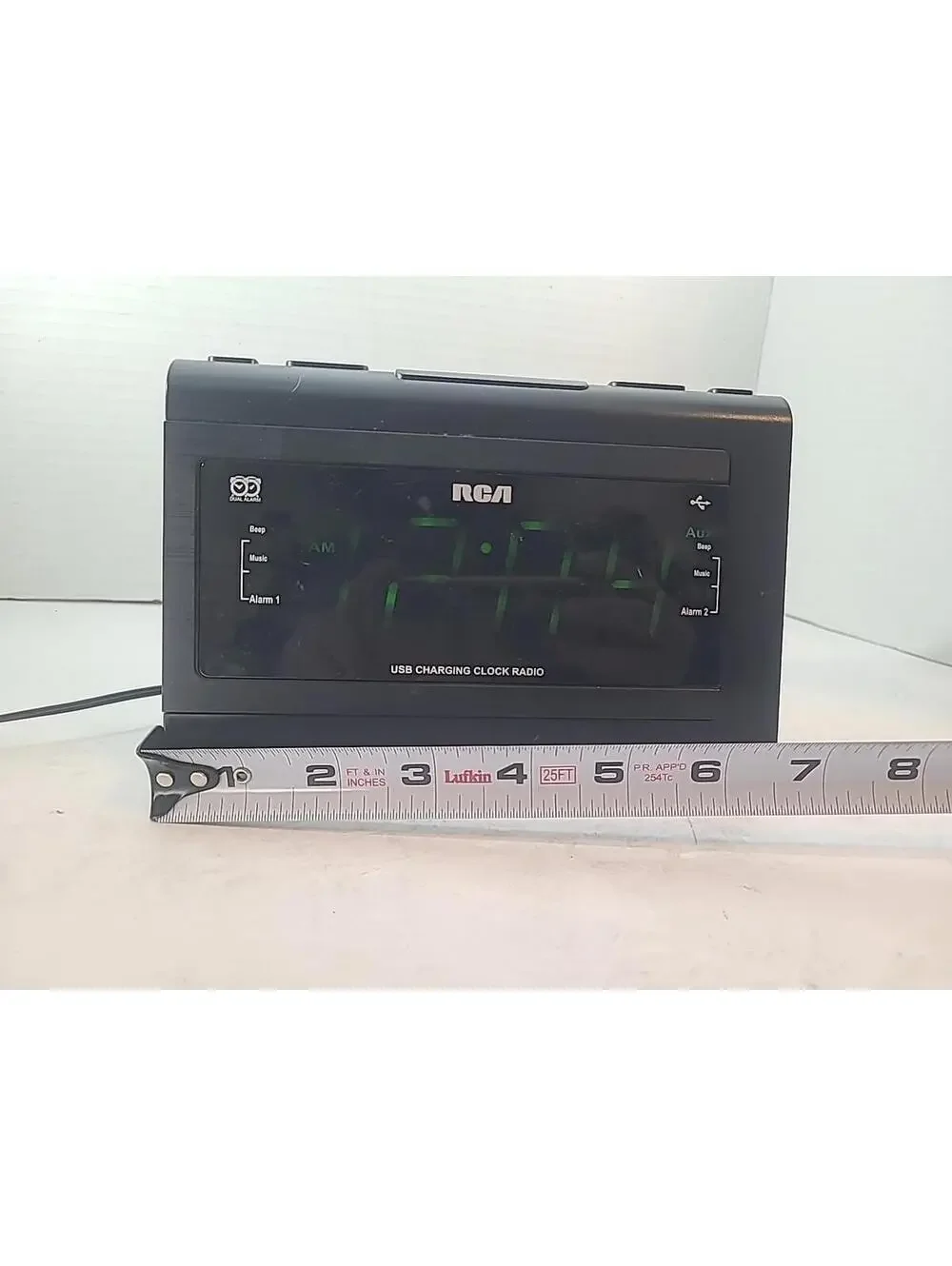 RCA Dual Alarm USB Charging FM Clock Radio Battery Backup Model RC142-D Read